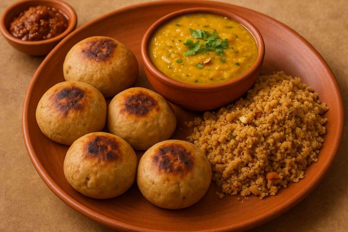 Rajasthani Dal Baati Churma Recipe: घर बैठे लें राजस्थान के शाही स्वाद का मजा, इस तरह बनाएं स्वादिष्ट दाल बाटी चूरमा