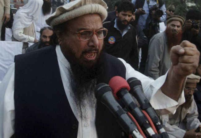 नवाज ने पाकिस्‍तान में किया मोदी का स्‍वागत, आतंकी हाफिज ने उगला जहर