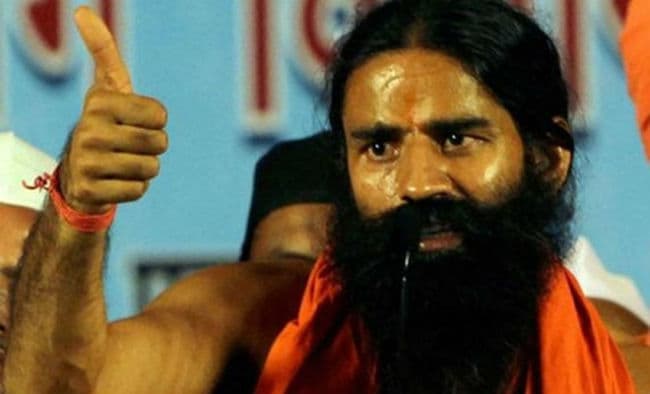 अखाड़े में उतरे बाबा रामदेव, पहलवान को दी पटखनी, योग और दूध को बताया ताकत का राज