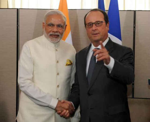 पीएम मोदी ने डेविड कैमरन और फ्रांस्वा ओलोंद से की मुलाकात