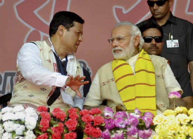 असम चुनाव : मोदी ने कहा - कभी असम की चाय बेचता था, अब कर्ज चुकाने का एक मौका दें