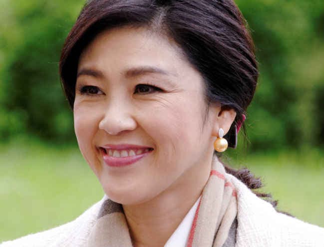 बर्खास्त थाई प्रधानमंत्री ने जुंटा से लोगों के अधिकार और आजादी लौटाने को कहा