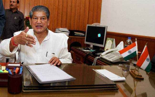 जेल जाने से नहीं डरता, CBI को हथियार की तरह इस्तेमाल कर रही है मोदी सरकार : रावत