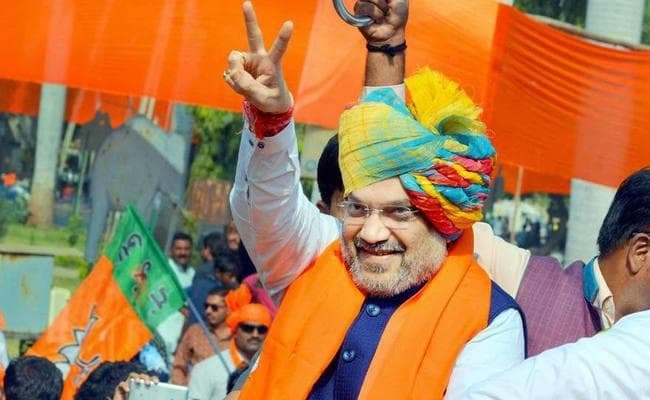 अमित शाह ने कहा-गुजरात चुनाव कांग्रेस की जातिवादी, वंशवादी शासन बनाम पीएम के विकासवादी एजेंडा की लड़ाई