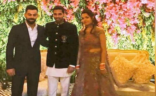 भुवनेश्वर-नुपूर के वेडिंग रिसेप्शन में पहुंचे विराट-धौनी, लेकिन अनुष्का...