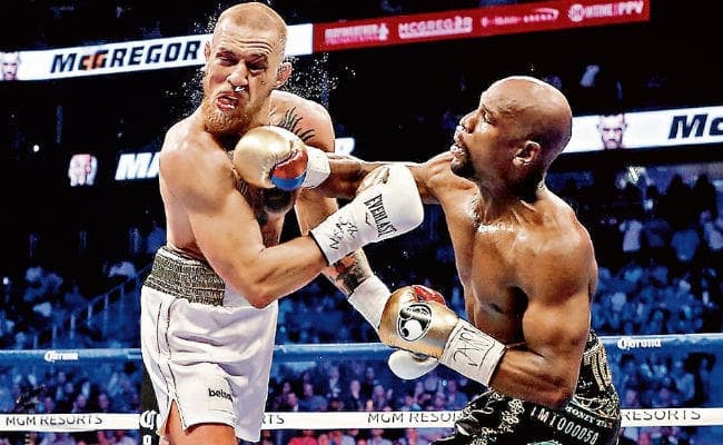 सदी की सबसे महंगी फाइट : मेवेदर का अजेय का रिकॉर्ड जारी, जीत ली अपनी 50वीं फाइट