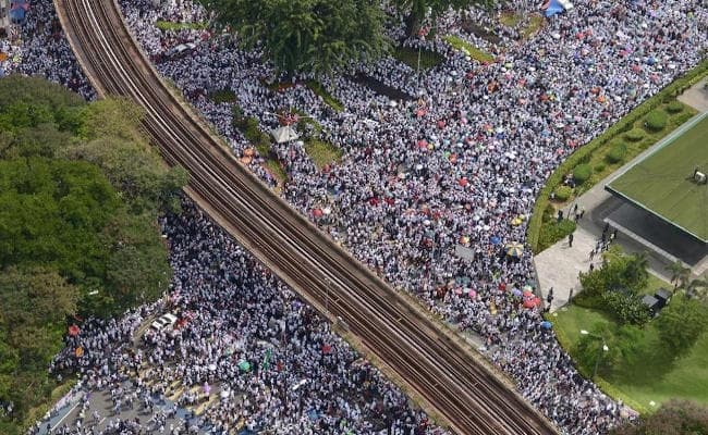 अपने अधिकारों के लिए मुस्लिम समुदाय ने मलयेशिया में निकाली रैली