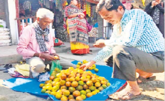 नागराकाटा : भूटानी संतरों से रंगा डुआर्स का साप्ताहिक हाट