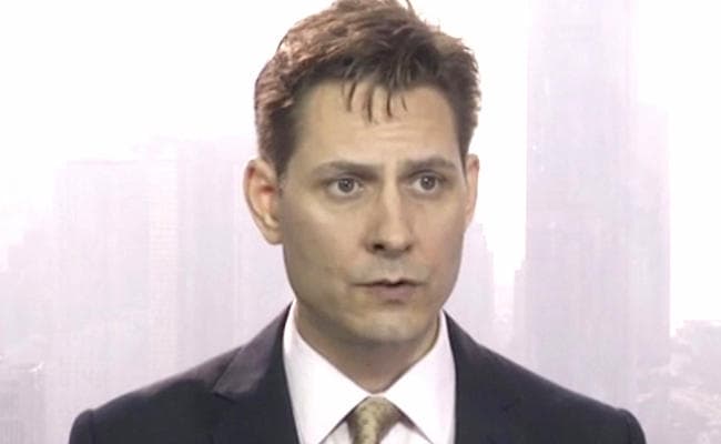 चीन में हिरासत में लिये गये पूर्व राजनयिक से मिले कनाडा के राजदूत