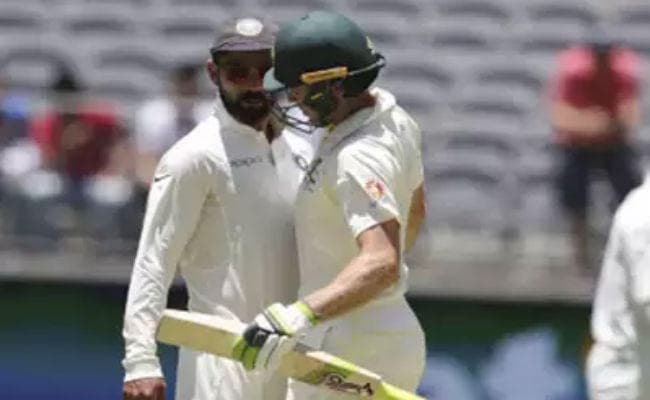 कोहली और पेन मैदान में भिड़े, अंपायर ने दी चेतावनी