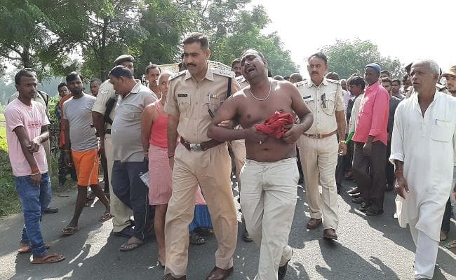 डायन बताकर महिला की हत्या, परिजनों ने किया रोड जाम