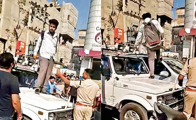 रांची : .....जब भाजपा नेता के बेटे ने पुलिस की जिप्सी पर चढ़ कर किया हंगामा