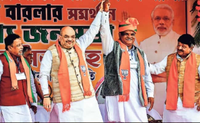 भाजपा प्रत्याशी के समर्थन में अमित शाह ने की सभा, कहा - बंगाल में भी लागू करेंगे एनआरसी