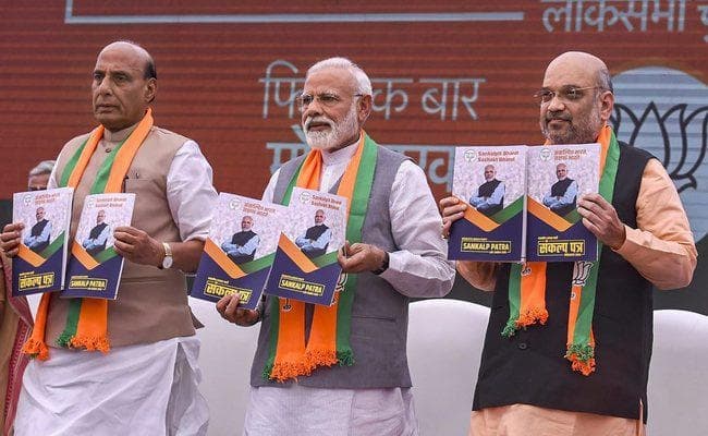 #BJPManifesto : राम मंदिर, अनुच्छेद 370 समाप्त करने, किसानों और दुकानदारों को पेंशन का वादा