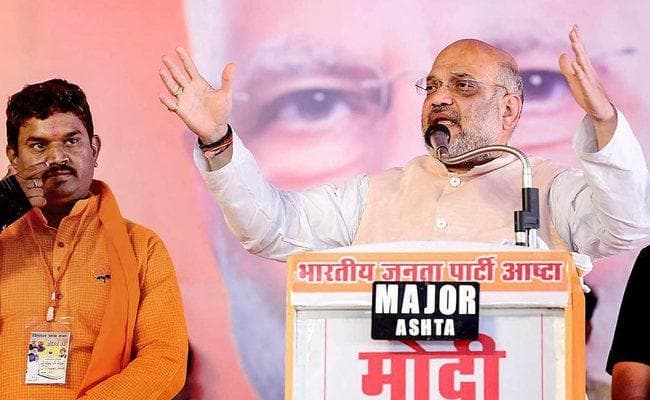 अमित शाह ने कहा - केंद्र में भाजपा की सरकार बनने पर कश्मीर से अनुच्छेद 370 हटा लिया जायेगा