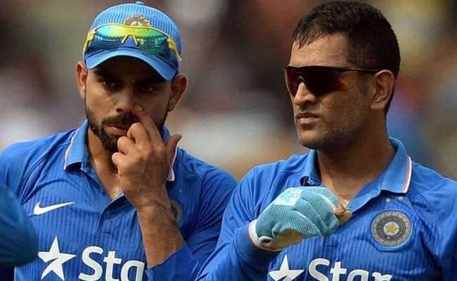 विराट और धौनी की मिठाई से बनायी प्रतिमा