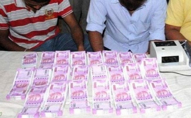 मालदा में चार लाख के जाली नोटों के साथ तस्कर गिरफ्तार