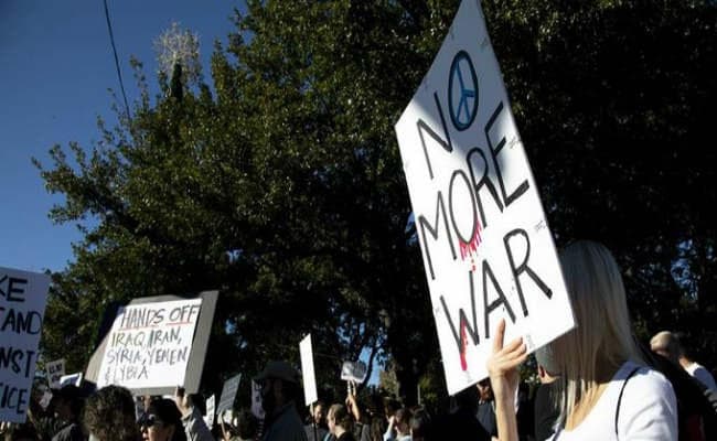 ईरान सर्मथक धड़े ने इराकी सुरक्षा बलों से अमेरिकी बलों से दूर रहने को कहा