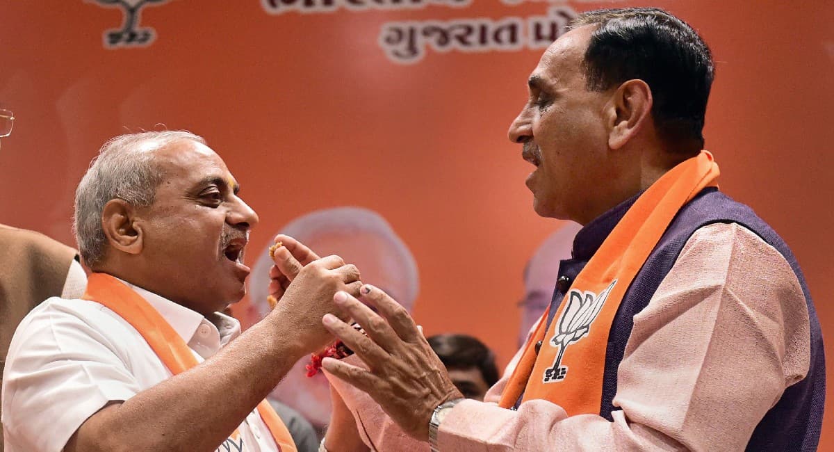 गुजरात चुनाव: मेहसाणा से विधायक नितिन पटेल नहीं लड़ रहे चुनाव, फिर भी रैलियों में उनके नाम का उल्लेख