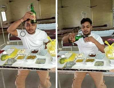 कोविड सेंटर में शराब की बोतल के साथ कैदी की तस्वीर वायरल, सीएम ने लिया एक्शन, एएसआई समेत 8 पुलिसकर्मी सस्पेंड