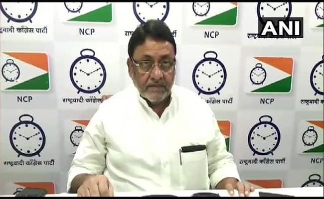 Corona Vaccination : पीएम मोदी खुद लगाएं वैक्सीन और बनाएं एक नया इतिहास, एनसीपी नेता नवाब मलिक की मांग