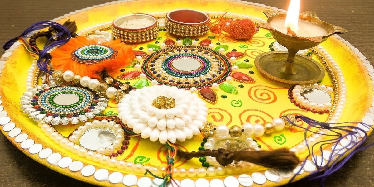 Raksha Bandhan 2022: रक्षाबंधन की थाली में चंदन, तिलक समेत जरूर रखें ये चीजें, जानें इनका महत्व