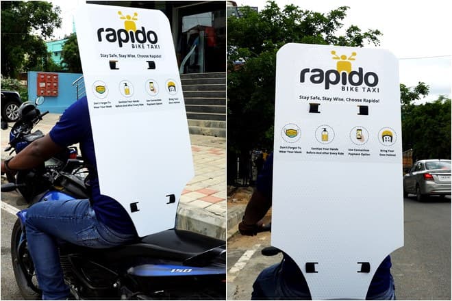 Rapido ने सोशल डिस्टेंसिंग के लिए अपनाया अनोखा तरीका, बाइक पर लगा दी बैक शील्ड