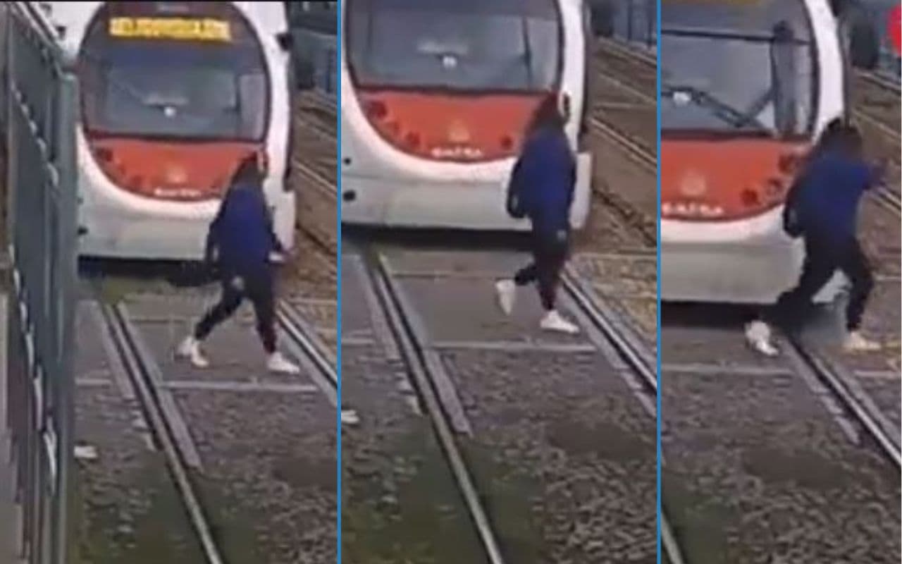 Viral Video: हेडफोन लगा कर रेलवे ट्रैक पार कर रही थी लड़की, फिर क्या हुआ देखें वीडियो