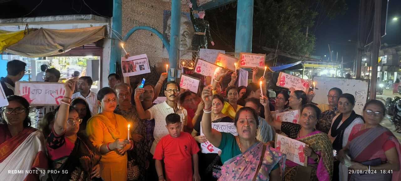 बंगाली समिति ने कैंडल जलाकर किया विरोध