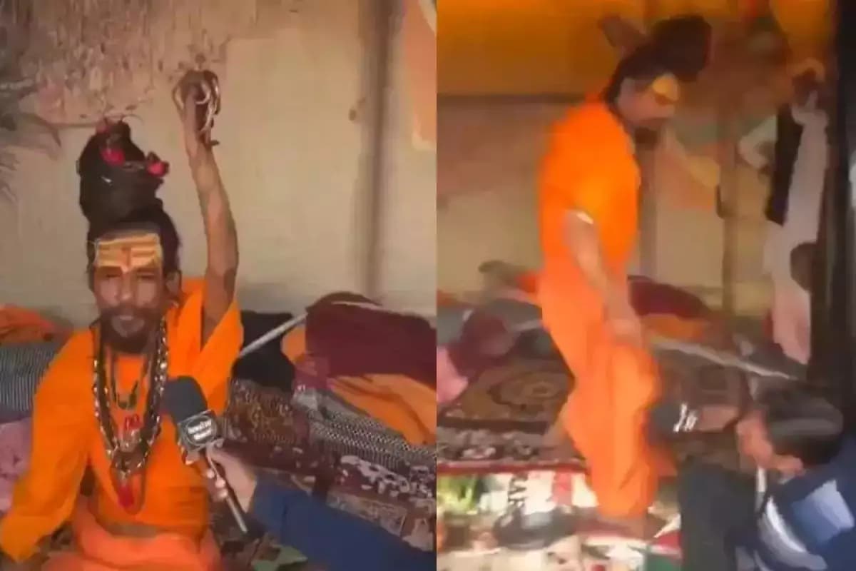 WATCH: कुंभ में इंटरव्यू ले रहे शख्स के इस सवाल पर भड़के बाबा ने चिमटे से कर दी पिटाई