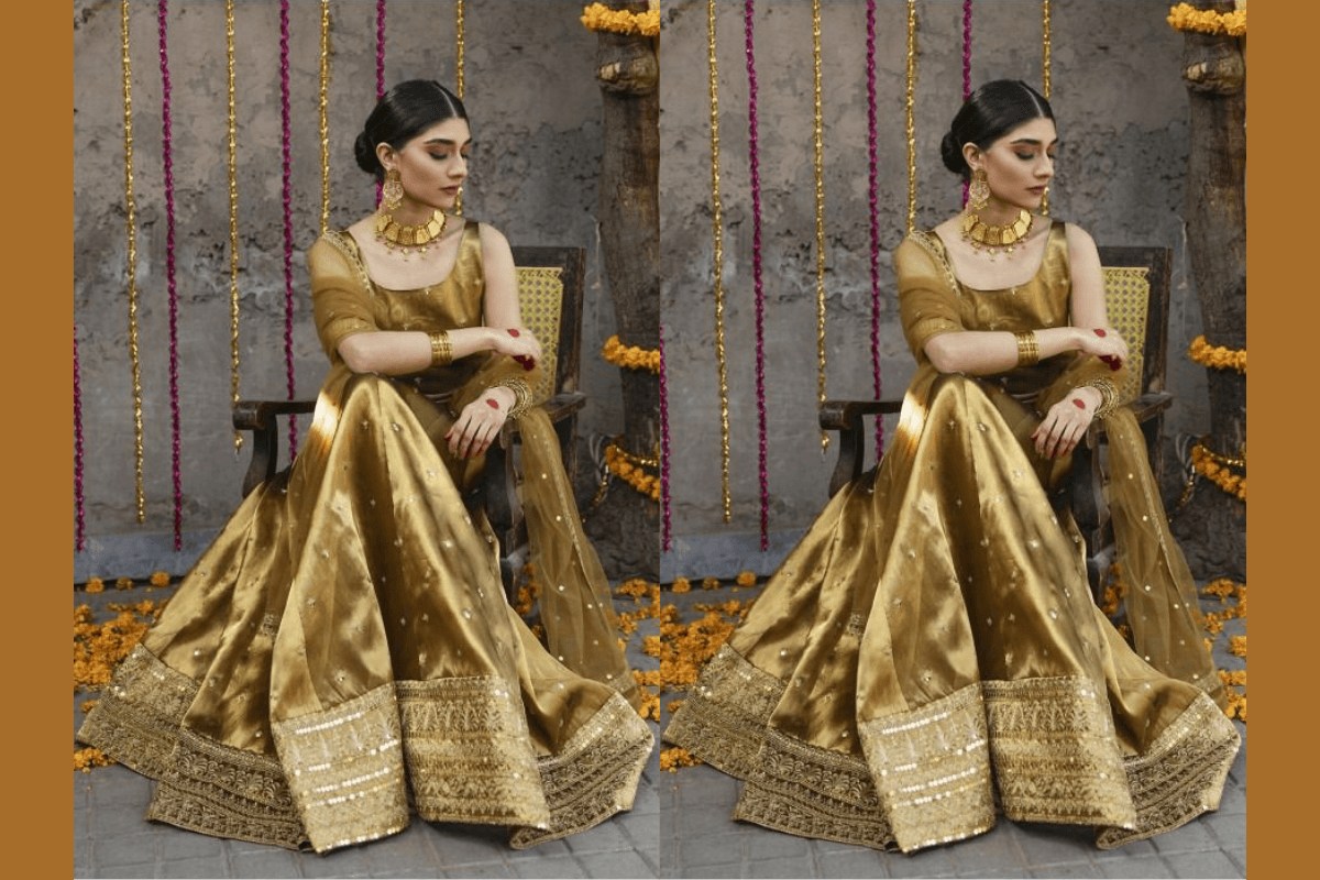 Golden Lehenga Design: अपनी पसंद से बनवाएं ये गोल्डन एस्थेटिक लहंगा, टेलर भैया को ऐसे करें गाइड Golden Lehenga Design: अपनी पसंद से बनवाएं ये गोल्डन एस्थेटिक लहंगा, टेलर भैया को ऐसे करें गाइड