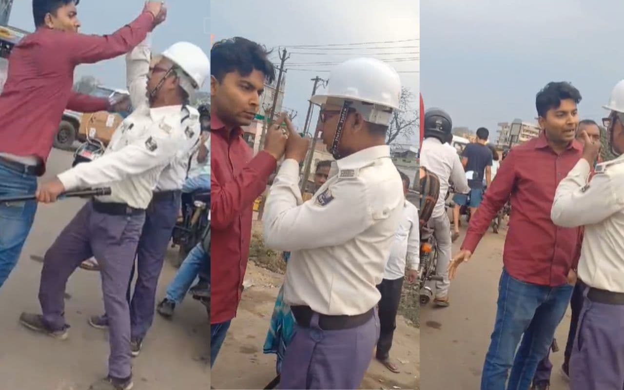 Viral Video: नियम समझाने पर ट्रैफिक पुलिस की कर दी पिटाई, हाथ भी मरोड़ा, देखें वीडियो