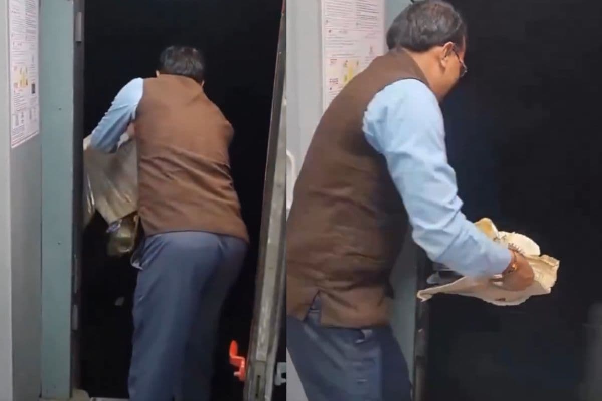 Viral Video: हिम्मत तो देखिए…चलती ट्रेन से कचरा फेंकते रेलवे कर्मचारी का वीडियो वायरल, लोगों ने लगाई क्लास