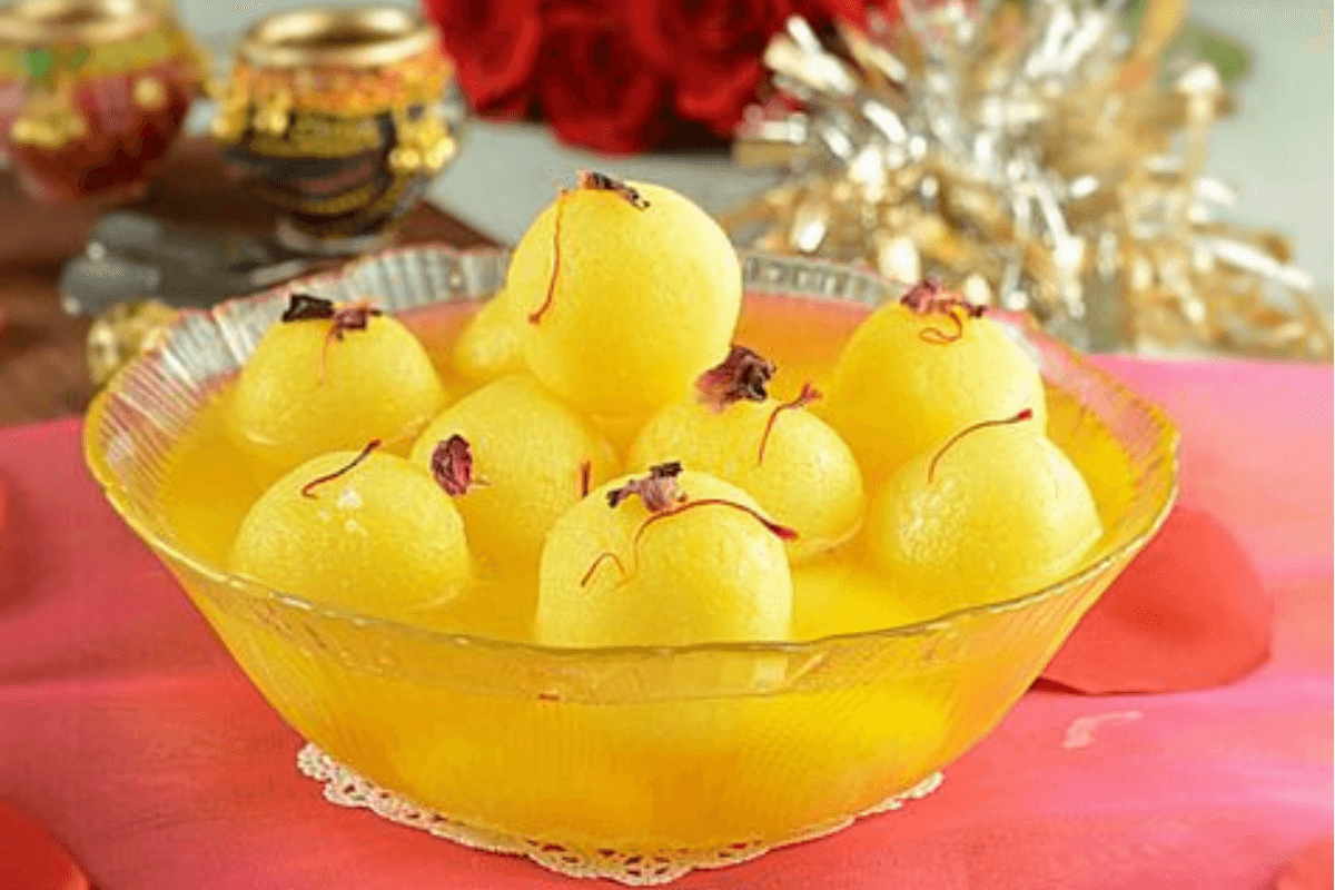Orange Rasgulla Recipe: घर पर ऐसे बनाएं टेस्टी और जूसी संतरे वाले रसगुल्ले