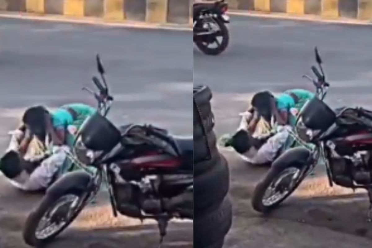 बीच सड़क पर पति की छाती पर चढ़ बैठी पत्नी, कुटाई का वीडियो वायरल