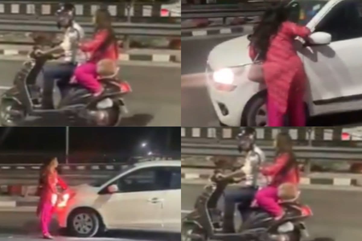 Viral Video: सड़क पर शराबी महिला ने मचाया बवाल, स्कूटी और कार पर चढ़कर किया ट्रैफिक जाम