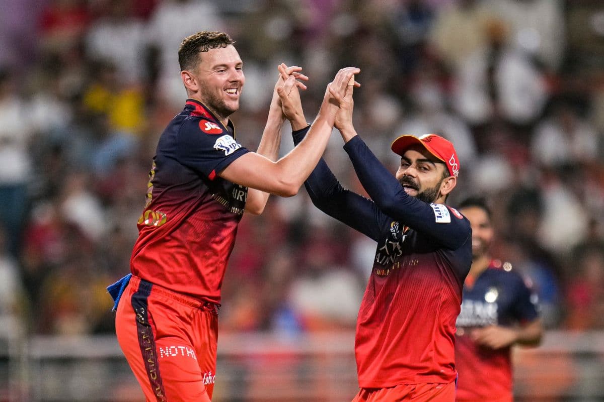 Josh Hazlewood and Virat Kohli