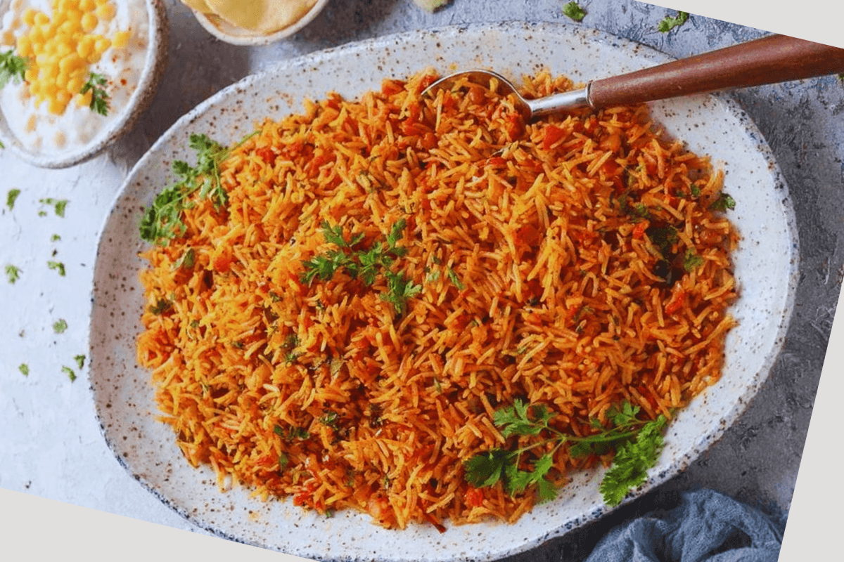 Chilli Garlic Tomato Rice Recipe: तीखा खाने के हैं शौकीन तो बनाएं चिली गार्लिक टोमैटो राइस