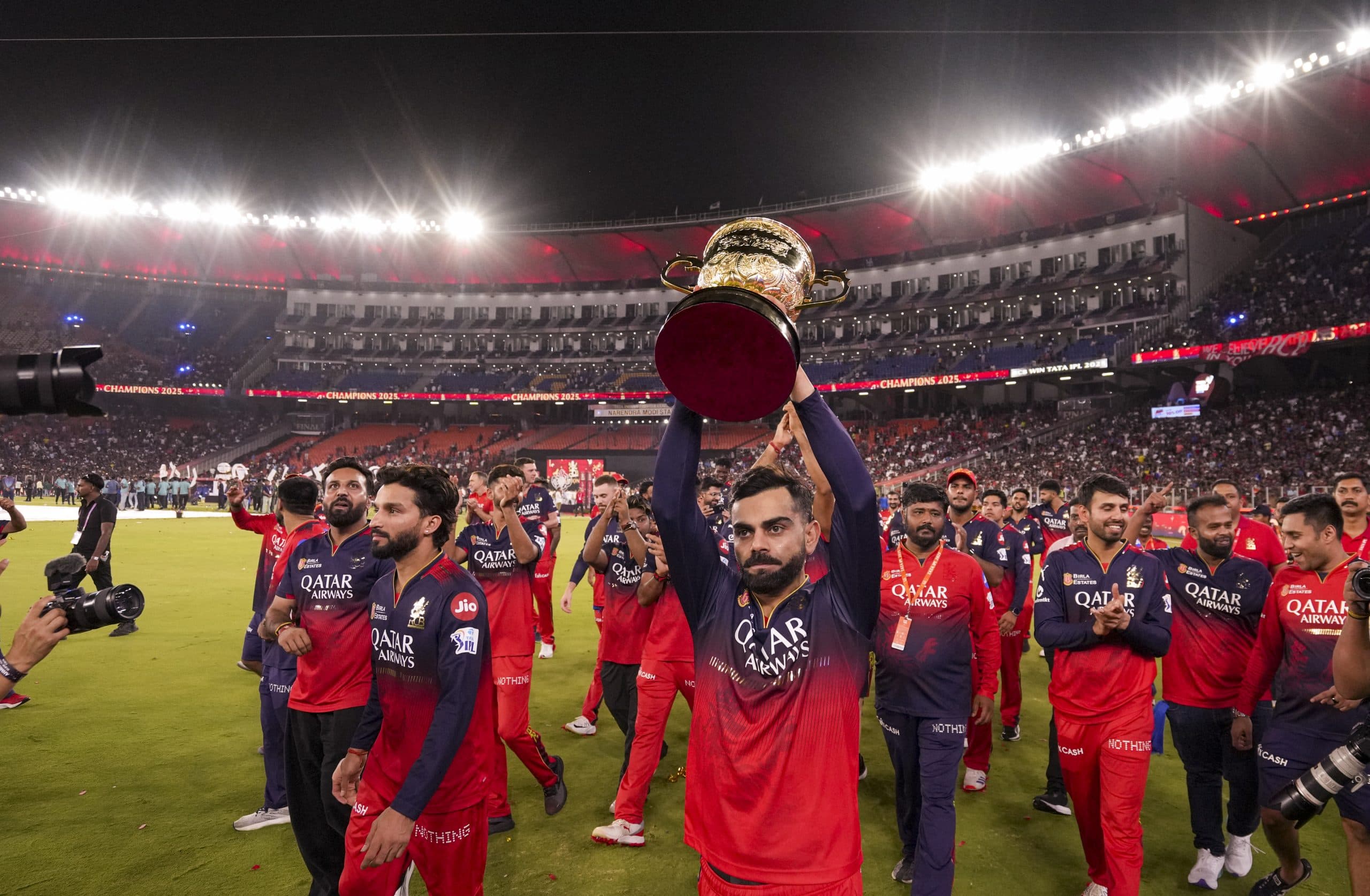 Virat Kohli holds the Indian Premier League (IPL) 2025 Trophy.