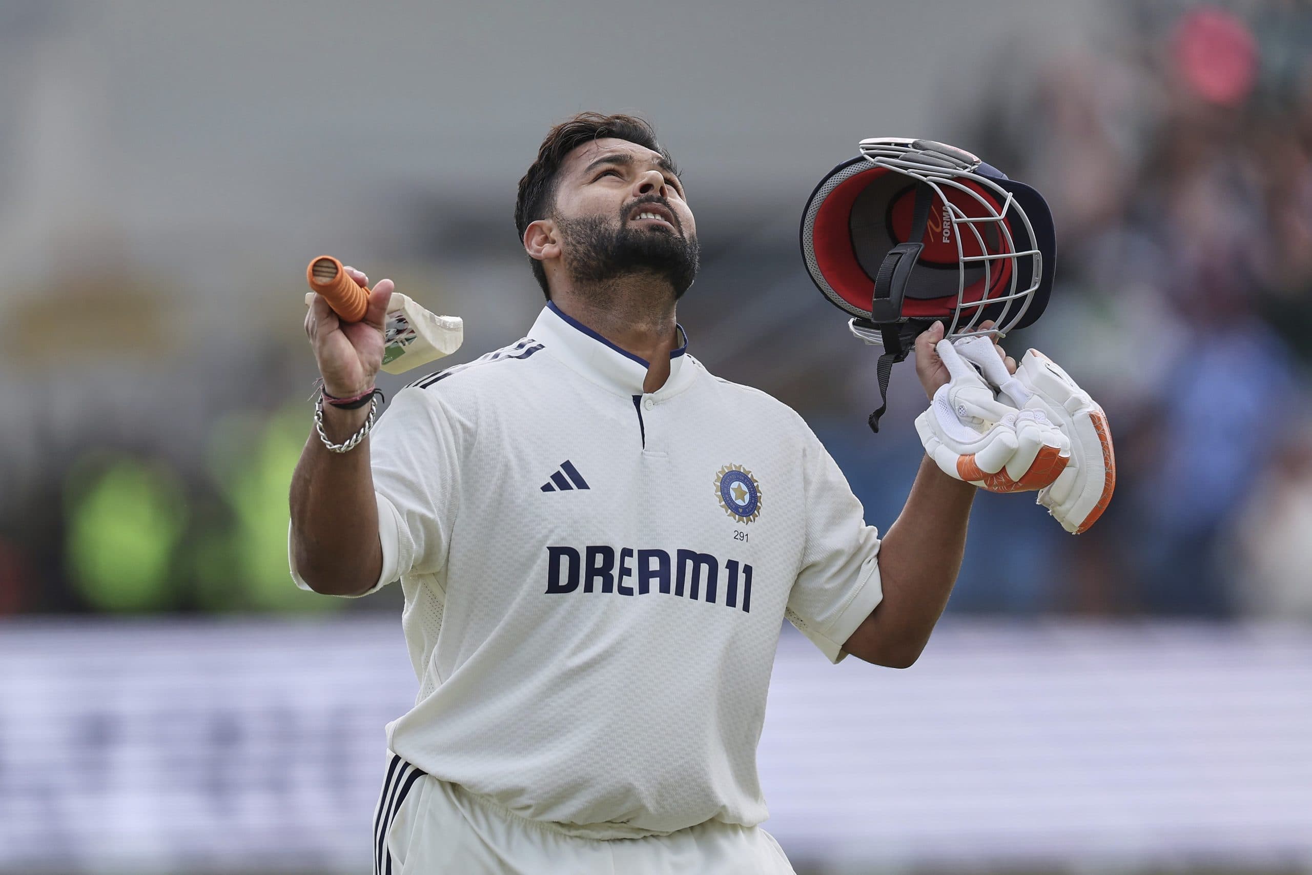 Rishabh Pant celebrates after scoring century