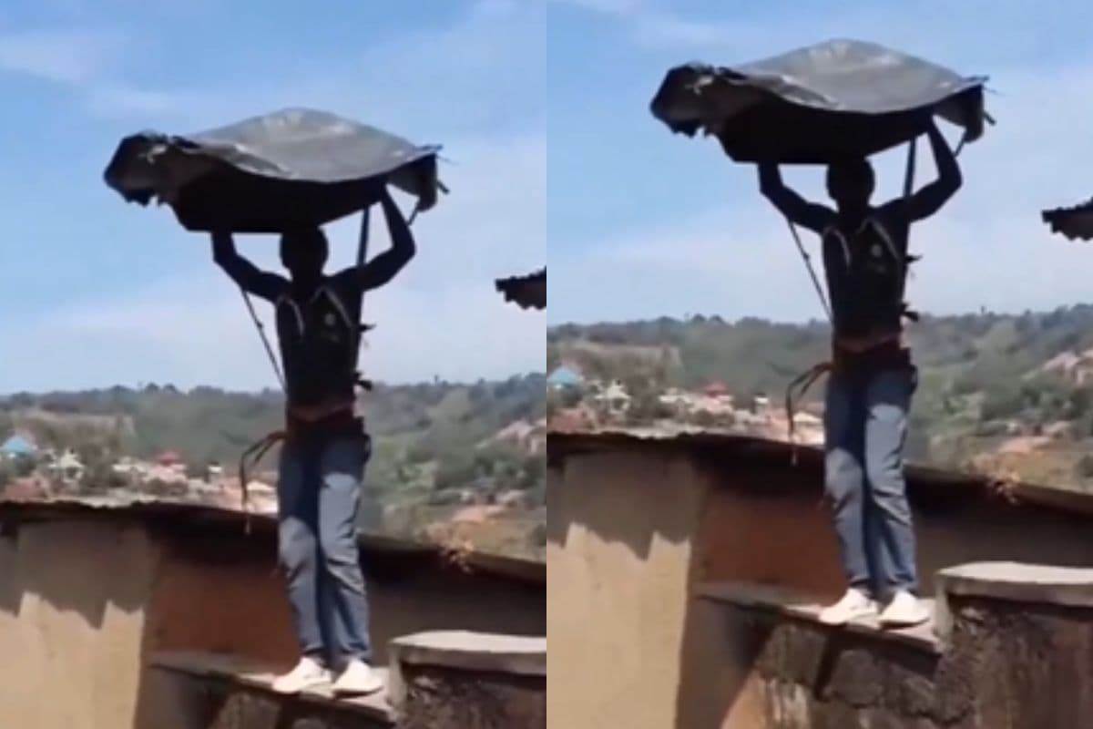 उड़ान से पहले ही लैंडिंग! जुगाड़ू पैराशूट के साथ दीवार से कूदा युवक, वीडियो देखकर नहीं रुकेंगी हंसी