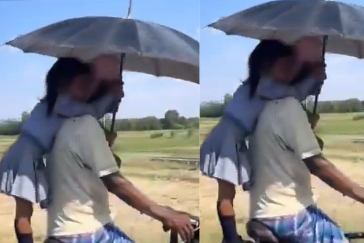 Viral Video: कड़ी धूप में पिता की छांव बनी बेटी, वीडियो देखकर नहीं रुकेंगे आंसू