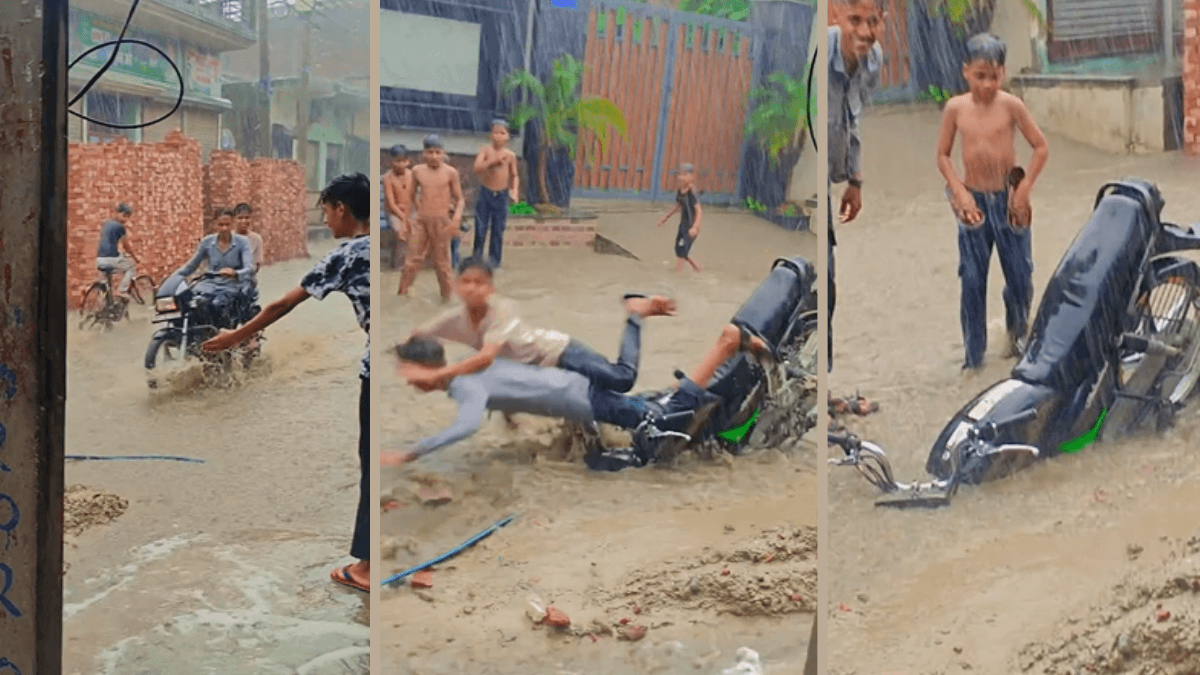 Viral Video: गड्ढे में गिरा बाइक सवार, फिर हंस कर लिया खुद को संभाल