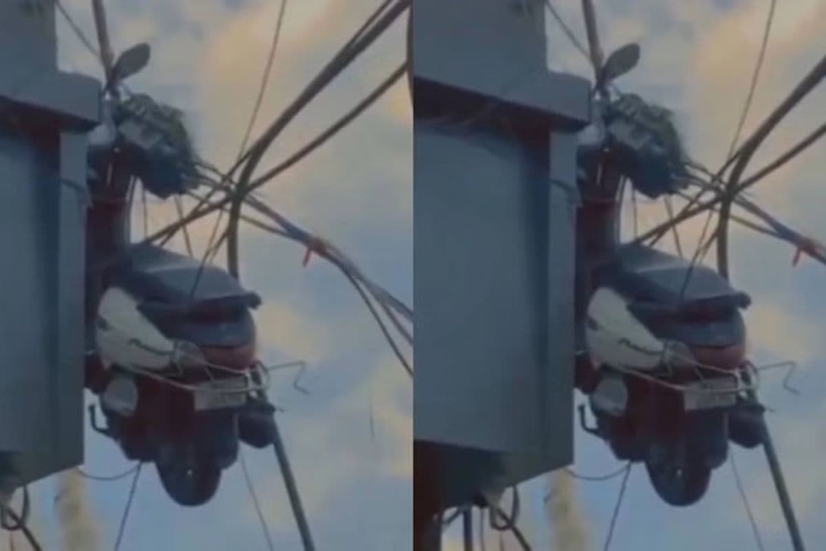 बिल्डिंग पर लटकती स्कूटी का वीडियो हुआ वायरल, लोग बोले- 'ये काम तो किसी पापा की परी का ही लग रहा है'