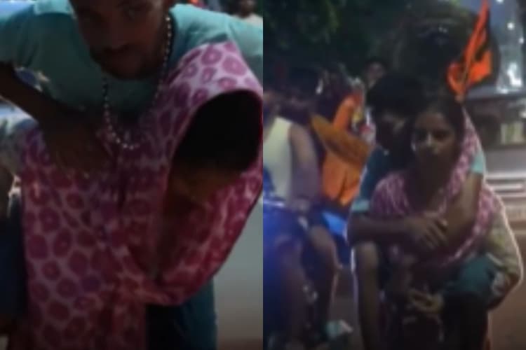 दिव्यांग पति को पीठ पर उठाकर कुछ इस तरह पत्नी ने की कांवड़ यात्रा, वीडियो देखकर नहीं रुकेंगे आंसू