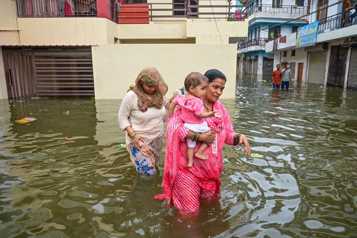 People-wade-through-water