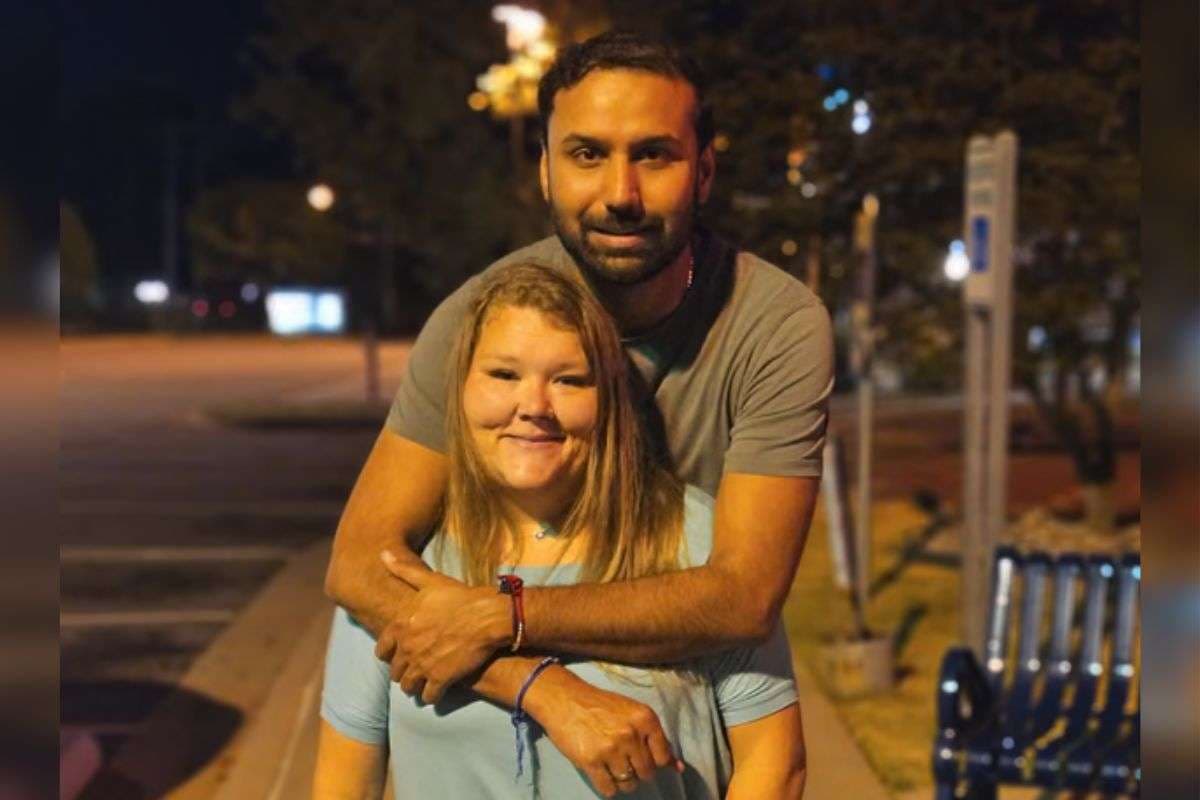 Indian American Kapil Raghu with his wife Ashley Mays