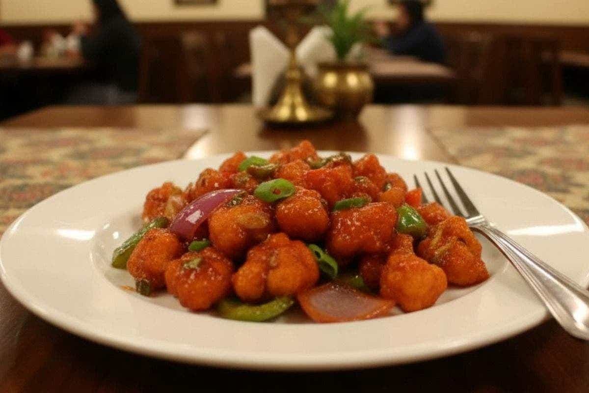 Chilli Gobi Recipe: घर पर बनाएं रेस्टोरेंट जैसा क्रिस्पी और मसालेदार चिली गोभी, स्नैक्स और डिनर दोनों के लिए परफेक्ट