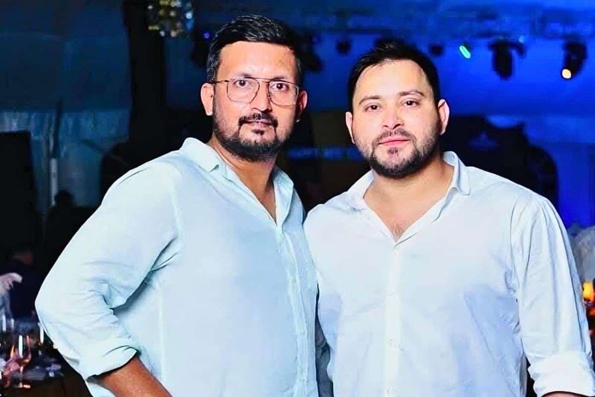 tejashwi with rameez nemat| JDU spokesperson Neeraj Kumar alleges that Tejashwi Yadav has gone abroad with UP gangster Rameez Nemat