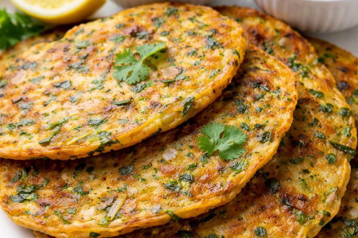 Pyaz Saag Chilla: सर्दियों में पकौड़े से हटकर ट्राई करें प्याज साग का चीला, हरी चटनी या सब्जी के साथ करें सर्व 